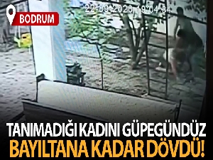 Tanımadığı kadını güpegündüz bayıltana kadar dövdü