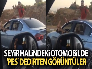 Seyir halindeki otomobilde 'pes' dedirten görüntüler