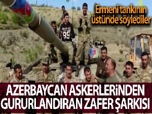 Azerbaycan askerlerinden, Ermenistan tankının üzerinde zafer şarkısı