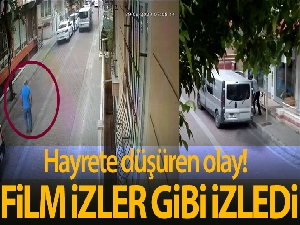 Dükkana giren hırsızları film izler gibi izledi