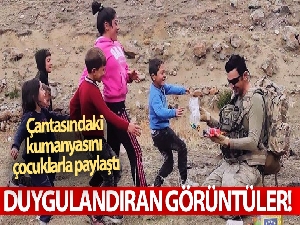 Duygulandıran görüntüler! Çantasındaki kumanyasını çocuklarla paylaştı