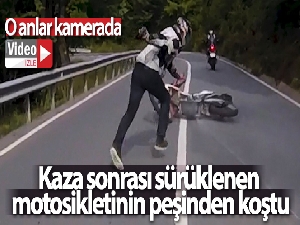 Kaza sonrası sürüklenen motosikletinin peşinden koştu