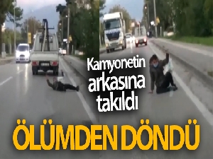 Bursa'da kamyonetin arkasına takılan genç ölümden döndü