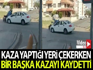 Kaza yaptığı yeri çekerken başka kaza anını görüntüledi