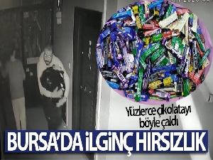 Bursa'da bir marketten çelik kasa ve 251 adet çikolata çaldı...O anlar kamerada