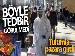 Böyle tedbir görülmedi, tulumla pazara girdi