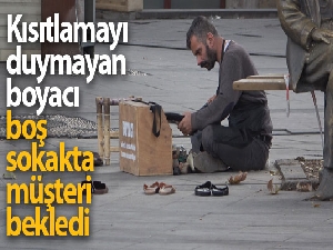 Kısıtlamayı duymayan boyacı boş sokakta müşteri bekledi