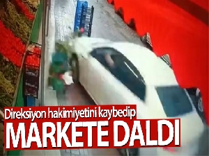 Sürücü markete daldı, o anlar kamerada