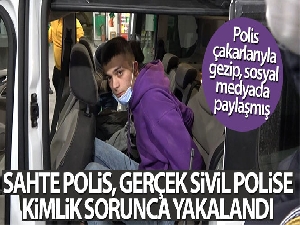 Sahte polis, gerçek sivil polise kimlik sorunca yakalandı
