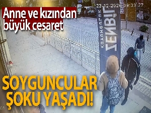 Kuyumcu anne kız, soygun girişimini böyle önledi