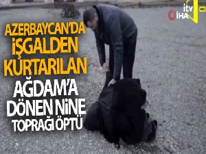 Azerbaycan'da işgalden kurtarılan Ağdam'a dönen nine toprağı öptü