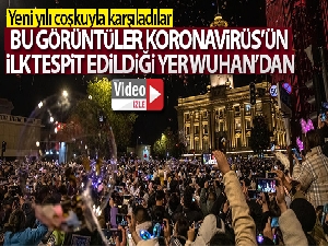 Covid-19'un ilk ortaya çıktığı Wuhan'da halk yılbaşında kent merkezini doldurdu