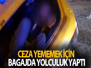Ceza yememek için taksinin bagajına girdi yakayı ele verdi