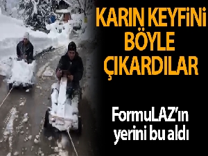 Rize'de tahta arabalarını iple kamyonete bağlayan 2 kafadar kar keyfini böyle yaşadı