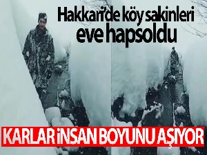 Köy sakinleri insan boyunu aşan kardan dolayı evlerine hapsoldu