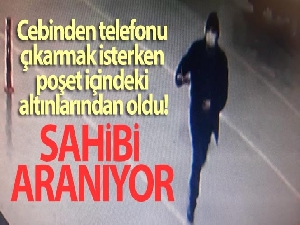 Cebinden telefonu çıkarmak isterken poşet içindeki altınlarından oldu