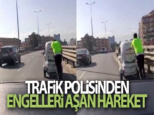Antalya'da trafik polisinden engelleri aşan hareket