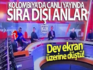 Kolombiya'da canlı yayında sıra dışı anlar: Dev ekran konuklardan birinin üzerine düştü