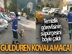 Rize'de temizlik görevlisi ile süpürgesini çalan köpek arasındaki kovalamaca cep telefonu kameralarına yansıdı
