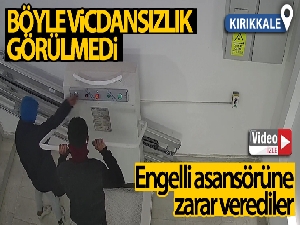 Engelli asansörüne zarar veren iki genç kamerada