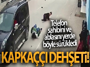 Kapkaççı dehşeti! Telefon sahibini ve ablasını yerde böyle sürükledi