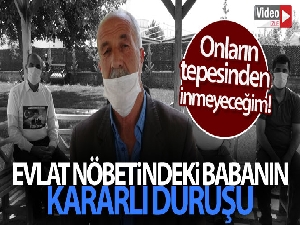 Evlat nöbetindeki babanın kararlı duruşu