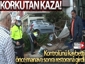 Esenyurt'ta kontrolünü kaybeden otomobil önce manava sonra restorana girdi