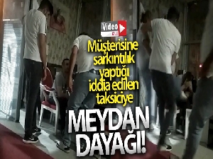 Müşterisine sarkıntılık yaptığı iddia edilen taksiciye kendi arkadaşlarından dayak kamerada