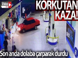 Otomobil markete girmek üzereyken son anda dolaba çarparak durdu