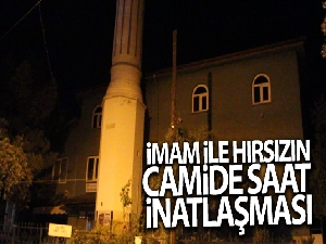İmamla inatlaşan hırsız kafaya koyduğu saati çaldı