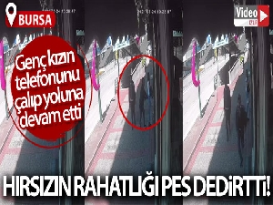 Genç kızın telefonunu çaldı, hiç birşey olmamış gibi yoluna devam etti