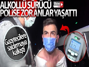 Alkollü sürücü polise zor anlar yaşatırken, gazetecilere saldırmaya kalkıştı