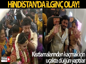 Hindistan'da bir çift Covid-19 kısıtlamalarından kaçmak için uçakta düğün yaptı
