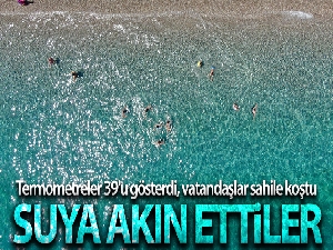 Antalya'da termometreler 39'u gösterdi, vatandaşlar sahile akın etti