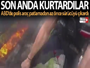 ABD'de polisler, yanan aracın camını kırarak sürücüyü son anda kurtardı