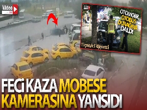 Hız sonucu kontrolden çıkan aracın durağa daldığı anlar kamerada