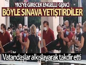 YKS'ye girecek engelli genci kucaklarında koşarak sınava yetiştirdiler