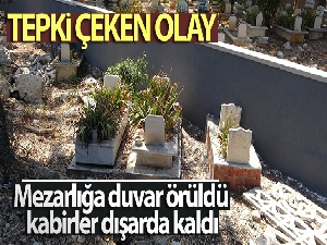 Mezarlığa duvar örüldü kabirler dışarda kaldı