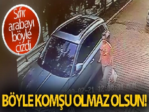 Komşusunun sıfır otomobilini çizerken güvenlik kamerasına yakalandı
