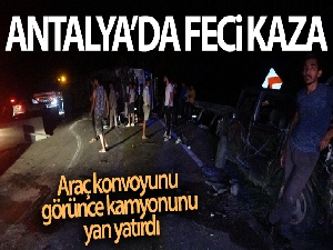 Freni boşalan kamyonun sürücüsü, araç konvoyunu görünce kamyonunu yan yatırdı