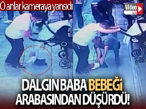 Dalgın baba bebeği arabasından düşürdü: O anlar kamerada