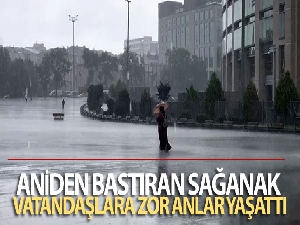 Şişli'de aniden bastıran sağanak vatandaşlara zor anlar yaşattı