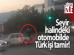 Seyir halindeki otomobilde Türk işi tamir kamerada