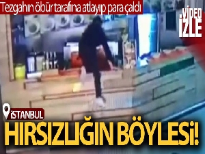 Tezgahın öbür tarafına atlayıp para çaldı: Soğukkanlı hırsız kamerada