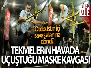 Otobüste tekmelerin havada uçuştuğu 'maske takma' kavgası kamerada