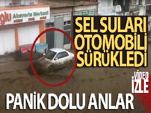 Sel suları otomobili sürükledi