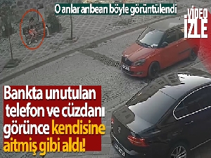 Bankta unutulan telefon ve cüzdanı kendisine aitmiş gibi aldı