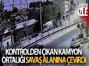 Kontrolden çıkan kamyon ortalığı savaş alanına çevirdi
