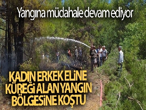 Kadın erkek eline küreği alan yangın bölgesine koştu
