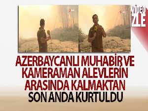 Azerbaycanlı muhabir ve kameraman alevlerin arasında kalmaktan son anda kurtuldu
